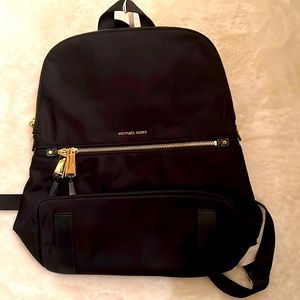 Black backpack, purse